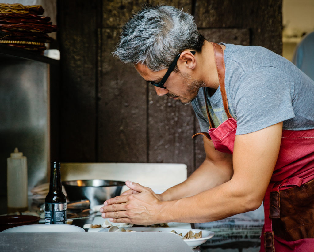 Kevin Patricio preparing a meal